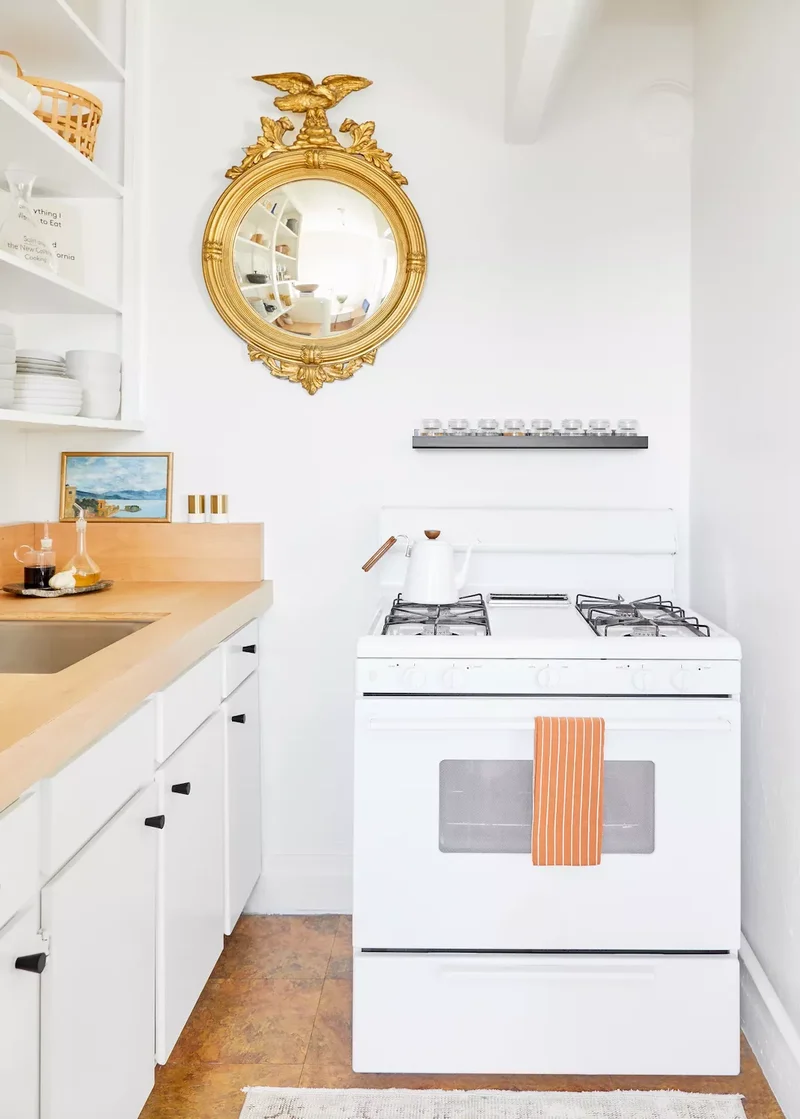 54 Kitchen Decor Ideas Across Multiple Styles to Make Yours 4 Hang a Vintage Mirror