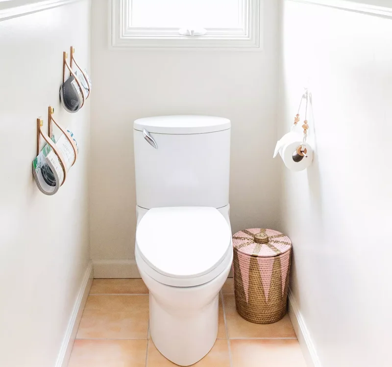 15 Creative Toilet Paper Storage Ideas for Your Bathroom 1 Hanging Around