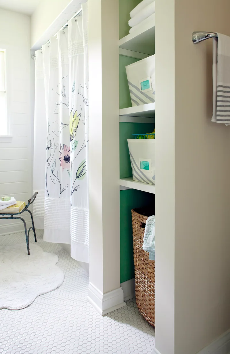 26 Smart Bathroom Shelf Ideas for Organized Toiletries 25 Hide the Hamper