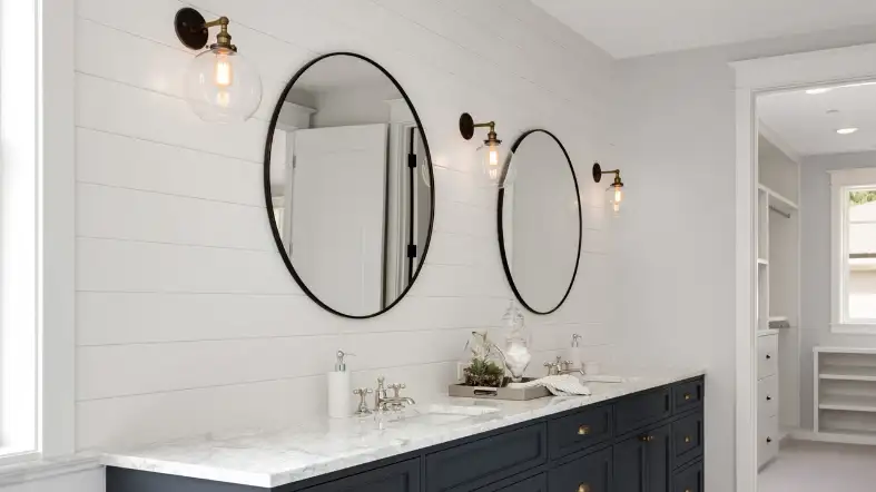 How do round mirror vanity lights differ