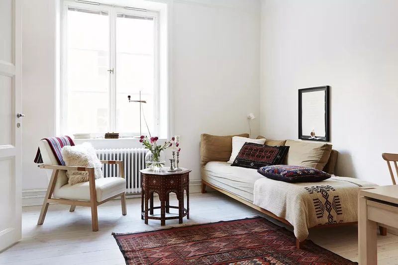 Creating Your Coziest Scandi Living Room This Winter 11 Incorporate Global Decor
