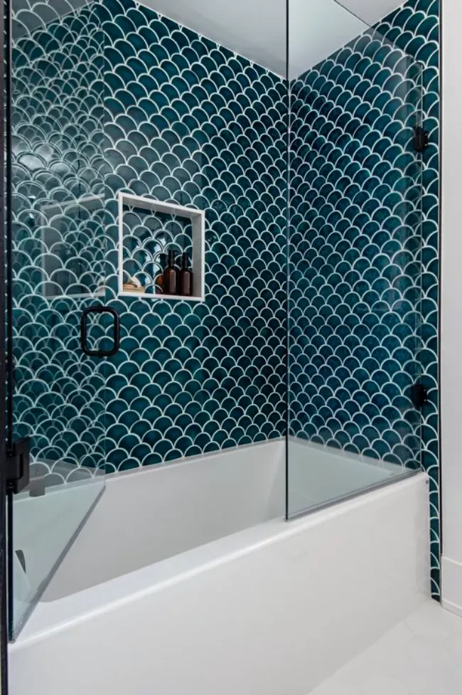 50 Moody Dark Bathroom Ideas for a Dramatic Transformation 44 Install Navy Blue Tile Around Your Tub