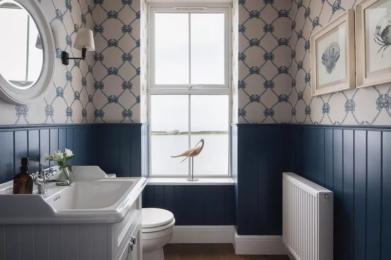 30 Beach-Inspired Bathroom Designs to Bring Coastal Vibes Home 23 Install Whimsical Wallpaper