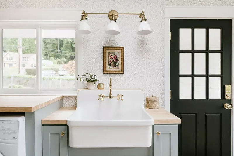 57 Laundry Room Ideas That Make Chores More Enjoyable 17 Install a Farmhouse Sink