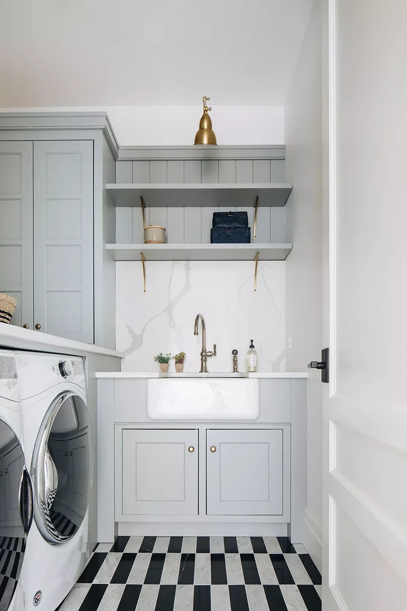 57 Laundry Room Ideas That Make Chores More Enjoyable 57 Install a Tall Backsplash