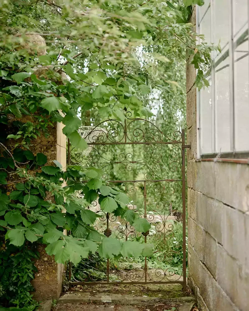 26 Secret Garden Ideas to Bring Your Favorite Books to Life 23 Install a Vintage Gate