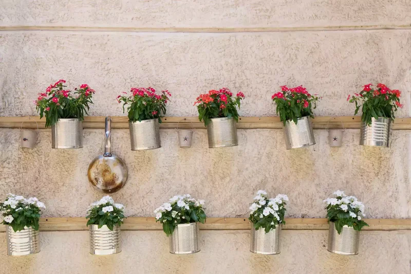 31 Creative Vertical Garden Designs for Your Home 1 Install a Wood Board for Planter Hooks