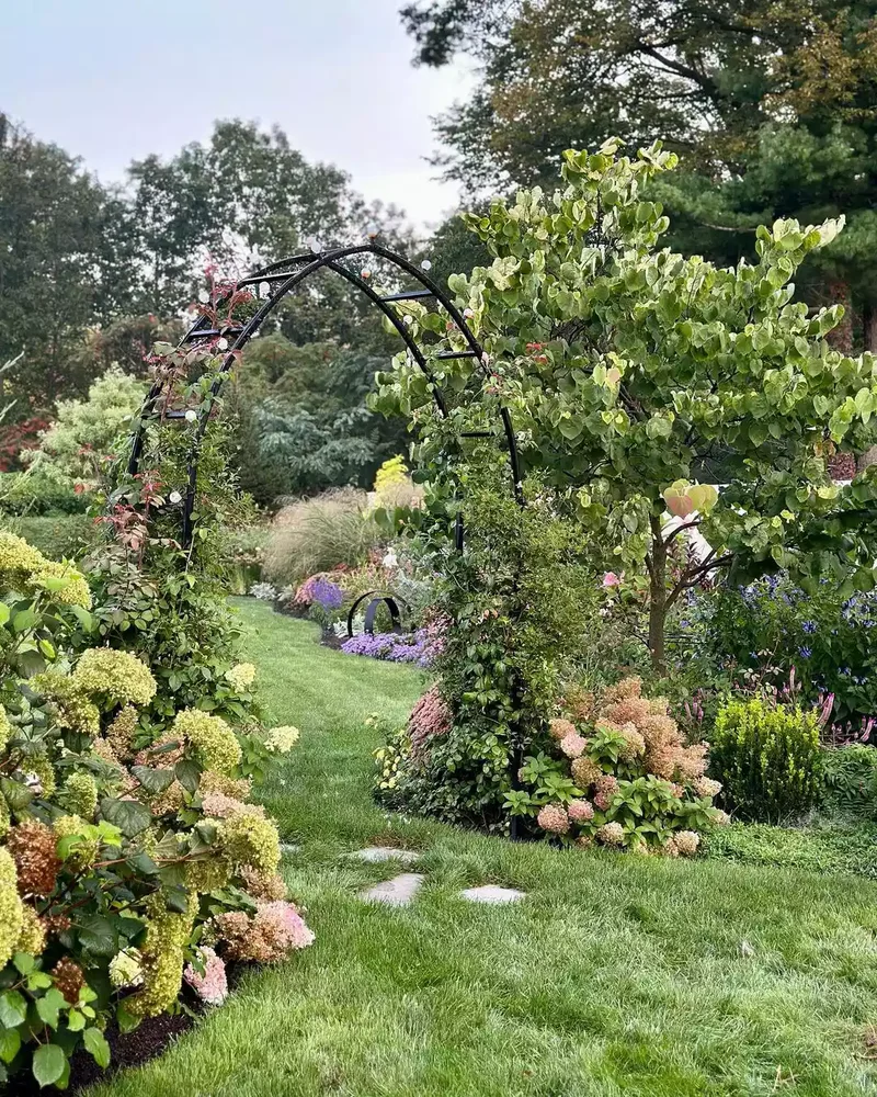 26 Secret Garden Ideas to Bring Your Favorite Books to Life 11 Install an Arched Arbor