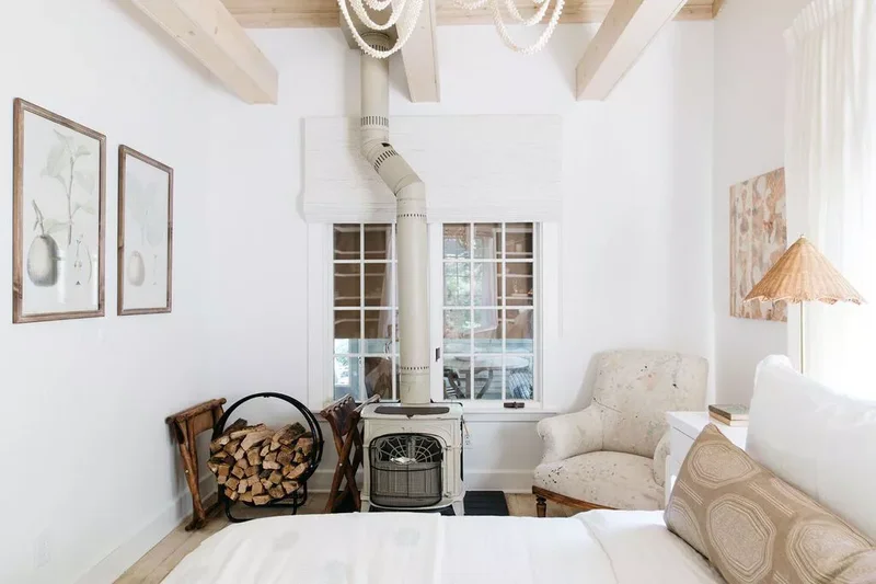 45 Warm and Inviting Bedroom Ideas for Ultimate Comfort 5 Keep the Wood Burning Stove
