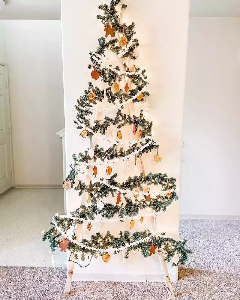 DIY Christmas Tree Ideas Worth Displaying for Your Guests 22 Ladder Tree and Lush Garden