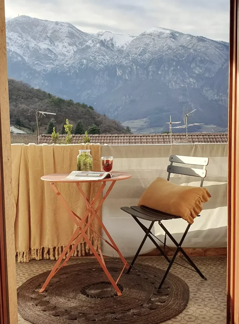 40 Budget-Friendly DIY Backyard Projects for Your Dream Oasis 17 Lay Down an Outdoor Rug