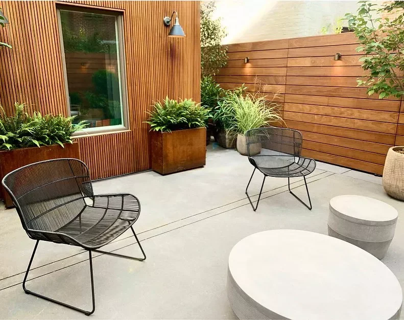 39 Contemporary Backyard Ideas to Elevate Your Outdoor Oasis 34 Lay a Concrete Patio