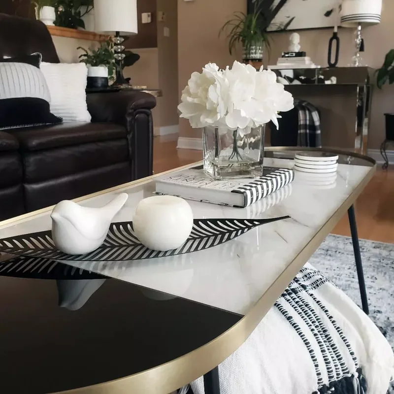 30 Black-and-White Living Room Ideas That Look Stunning 24 Layer Black-and-White Decor