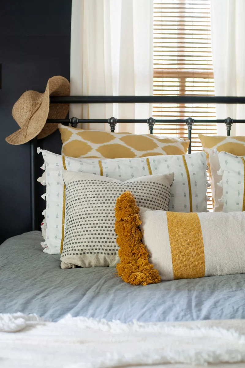 40 Bohemian Bedroom Ideas for Your Dreamy Personal Retreat 35 Layered Throw Pillows