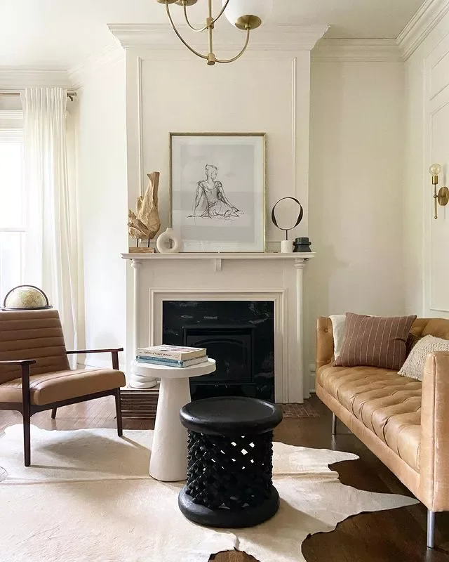 30 Living Room Wall Decor Ideas to Make a Bold Statement 23 Lean a Figure Sketch