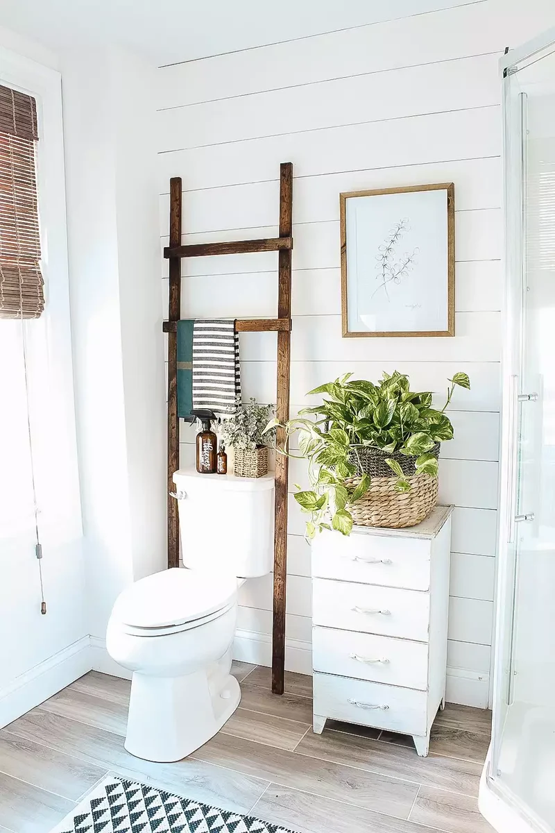 17 Stylish Over the Toilet Storage Ideas for Your Bathroom 3 Lean a Lovely Ladder