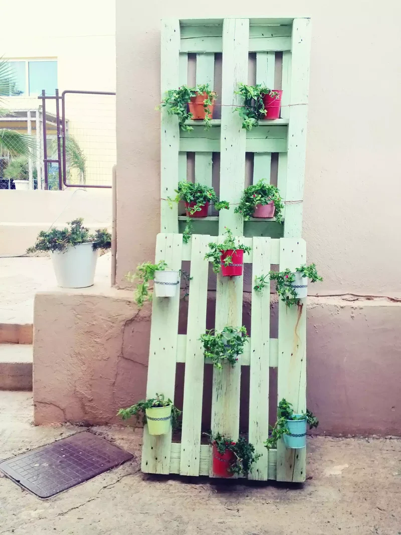 31 Creative Vertical Garden Designs for Your Home 10 Lean a Pallet Against a Wall