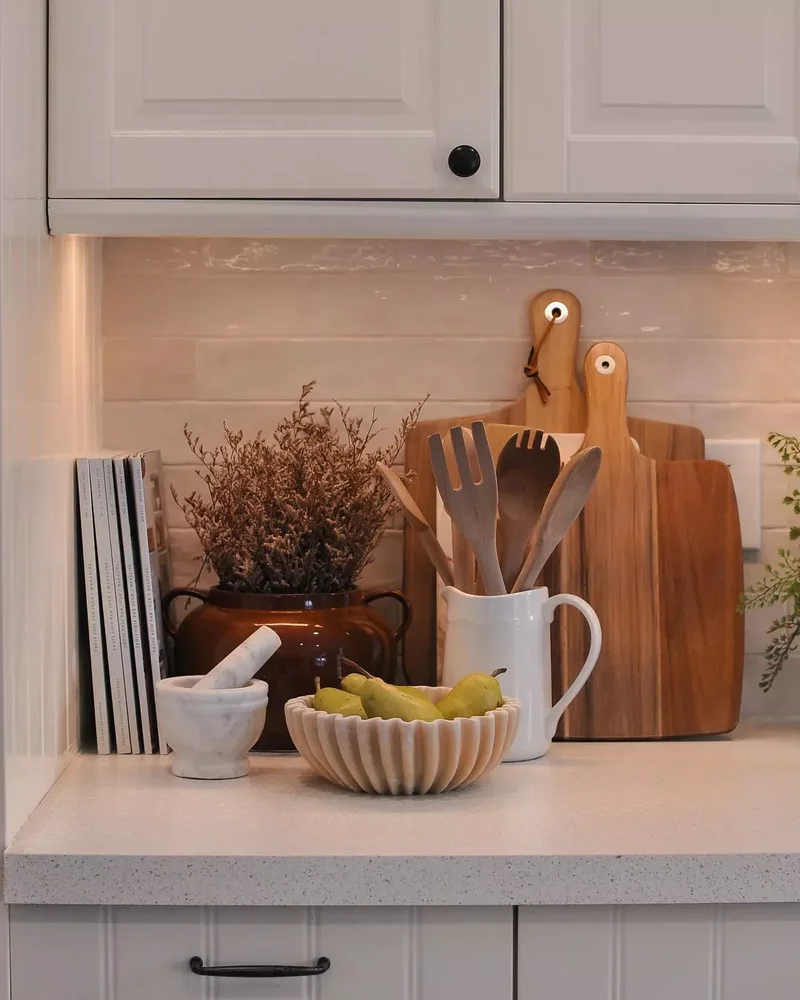 32 Country Kitchen Designs for a Cozy Cooking Retreat 30 Leaning Cutting Boards