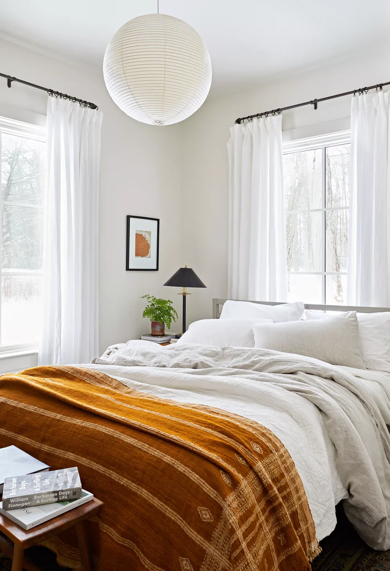 10 Clever Small Guest Bedroom Ideas for Cozy Comfort 7 Let In Light