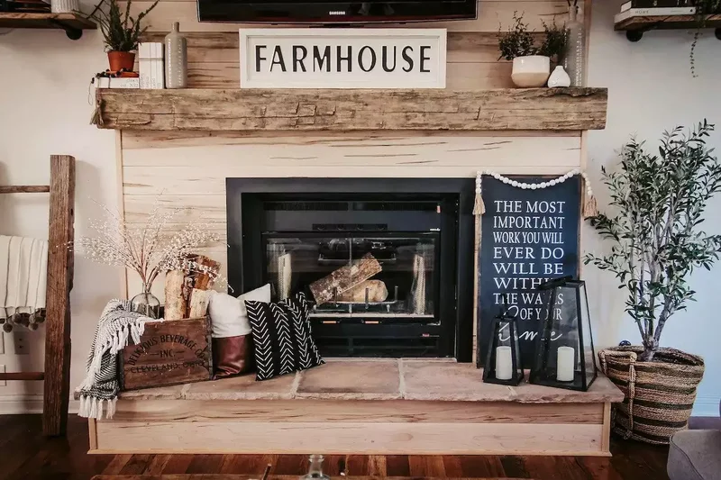 34 Cozy Farmhouse Fireplace Designs to Transform Your Room 22 Make Use of a Blanket Ladder
