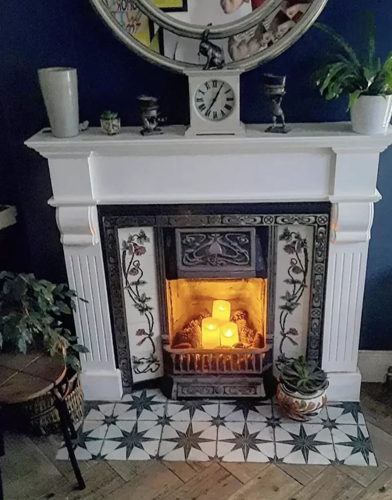 24 Creative Ways to Display Candles in Your Fireplace 9 Make a Nest