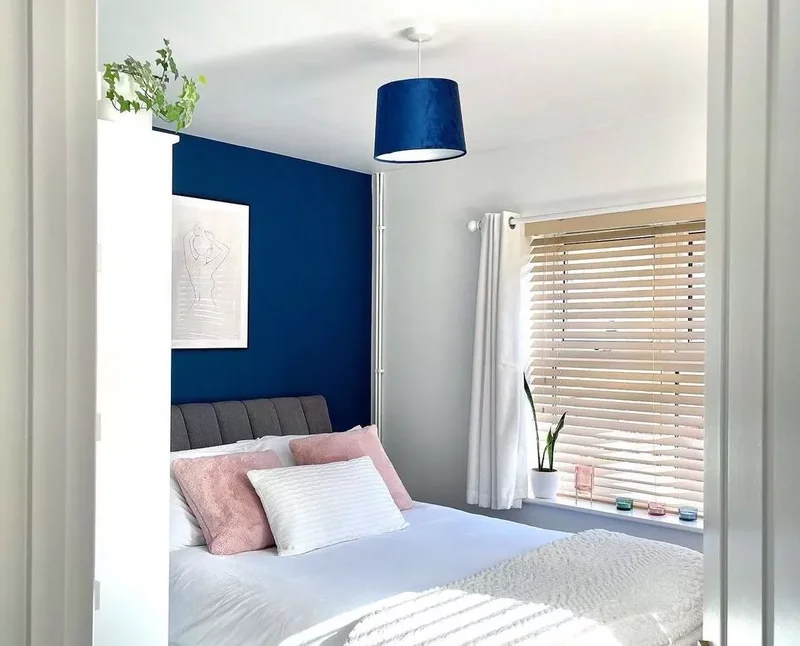 25 Navy Blue Bedroom Designs That Transcend Nautical Style 6 Match Your Light Fixtures to Your Walls
