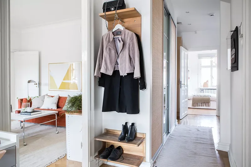 22 Beautiful Entryway Designs That Create Lasting Impact 19 Maximizing Vertical Storage