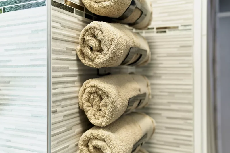 32 Clever and Beautiful Towel Storage Solutions 14 Mount a Towel Rack on the Wall