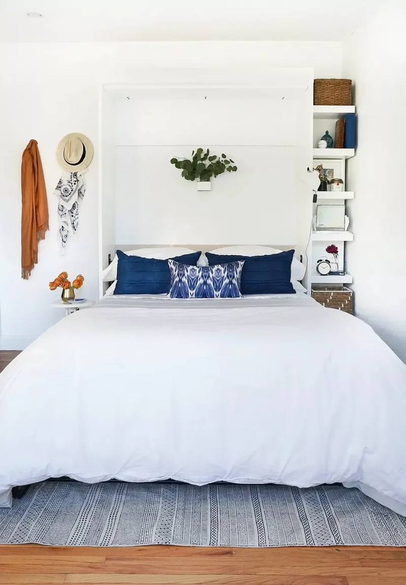 33 Space-Saving Murphy Bed Ideas We Love for Your Home 11 Murphy Bed Shelving