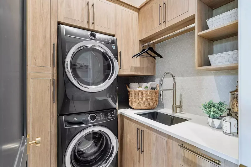 24 Laundry Room Cabinet Ideas for an Organized Space 4 Natural Wood Cabinets