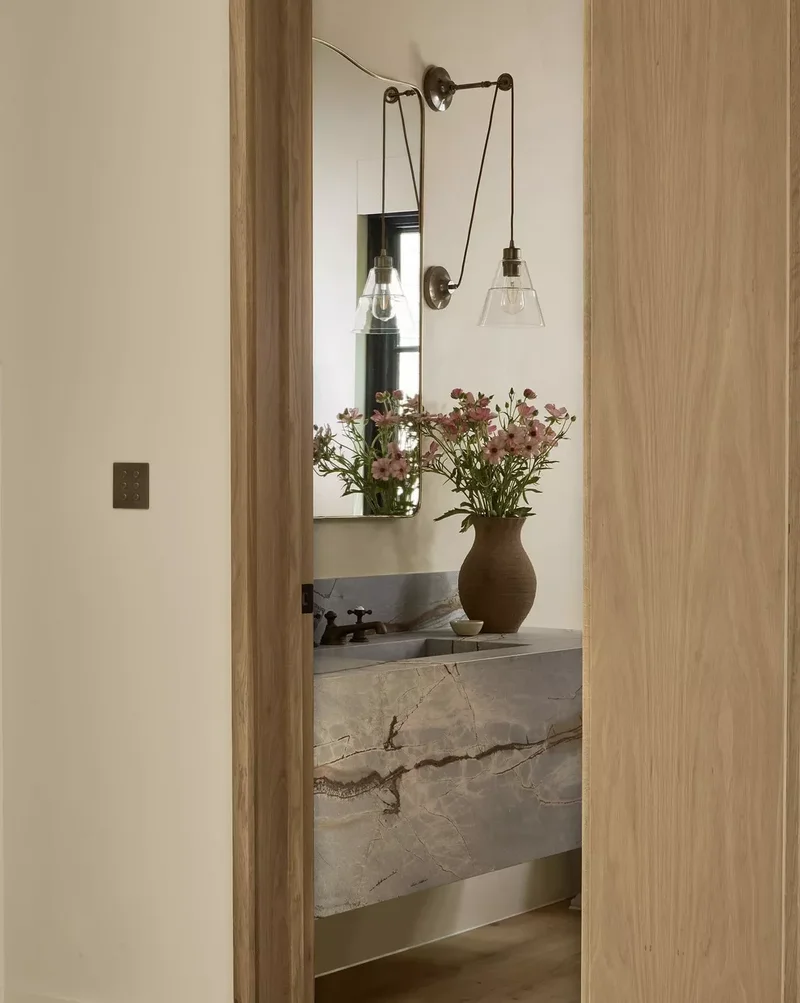 30 Neutral Bathroom Designs That Feel Timeless & Serene 2 Neutral Bathroom With a Vase