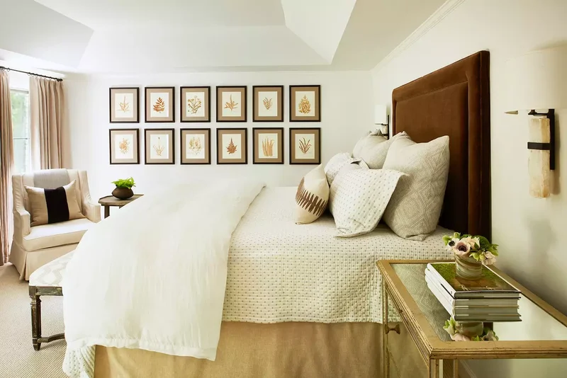 29 Neutral Bedroom Designs You'll Love Cozying Up In This Fall 10 Neutral Bedroom Gallery Wall