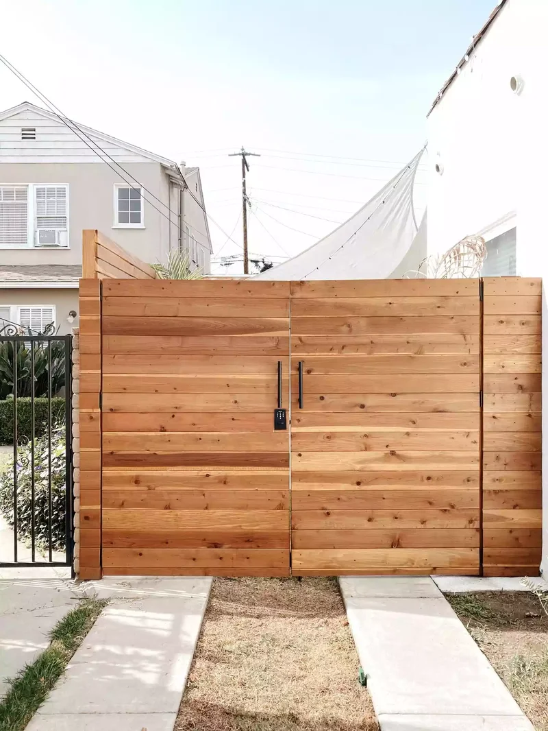 35 Beautiful Driveway Gate Ideas for Any Home Style 2 Opaque Wood Driveway Gate