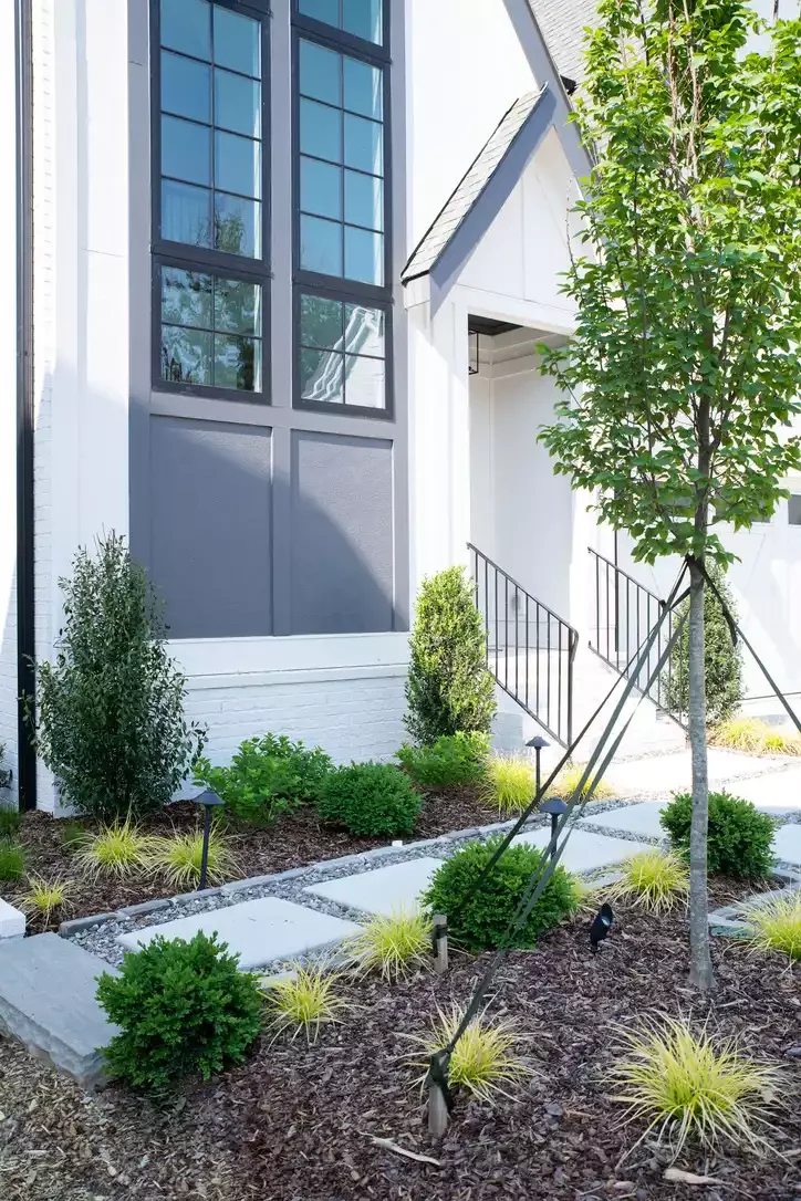 24 Stunning Driveway Landscaping Ideas for Amazing Curb Appeal 6 Ornamental Shrubs