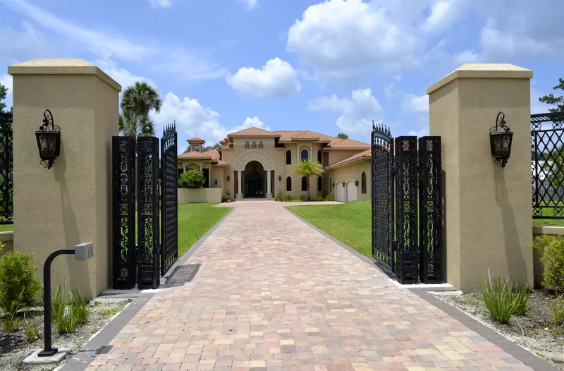 35 Beautiful Driveway Gate Ideas for Any Home Style 14 Ornate Iron Gate