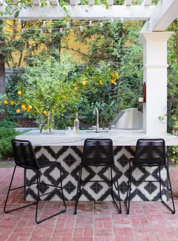 27 Smart and Stylish Small Outdoor Kitchen Design Ideas 13 Outdoor Kitchen With a Graphic Punch