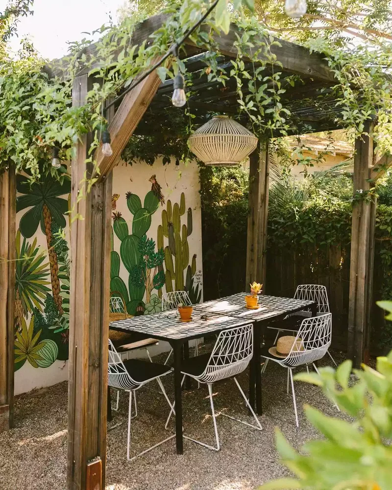 43 Budget-Friendly Backyard Makeover Ideas You'll Love 6 Paint a Garden Mural