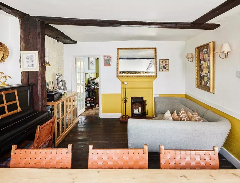 20 Yellow Living Room Ideas That Brighten Any Home 16 Paint a Half Wall