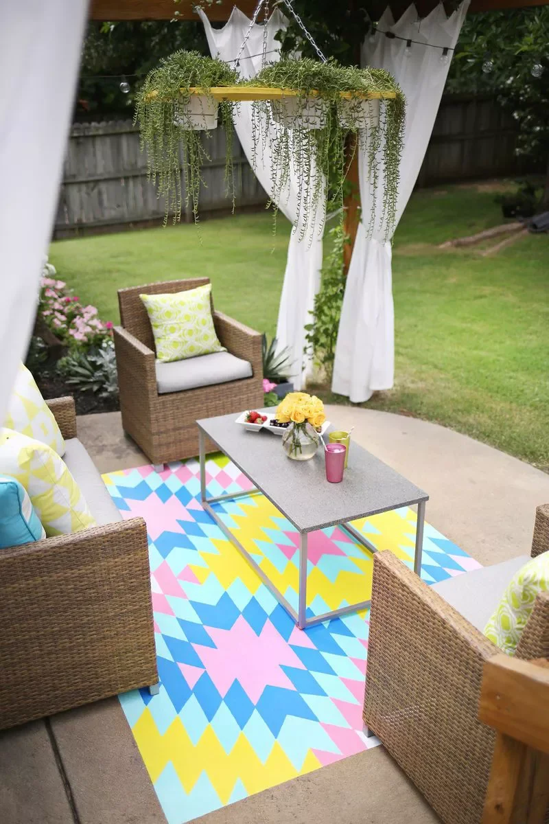 51 Clever Small Patio Ideas That Expand Your Outdoor Space 31 Paint a Rug