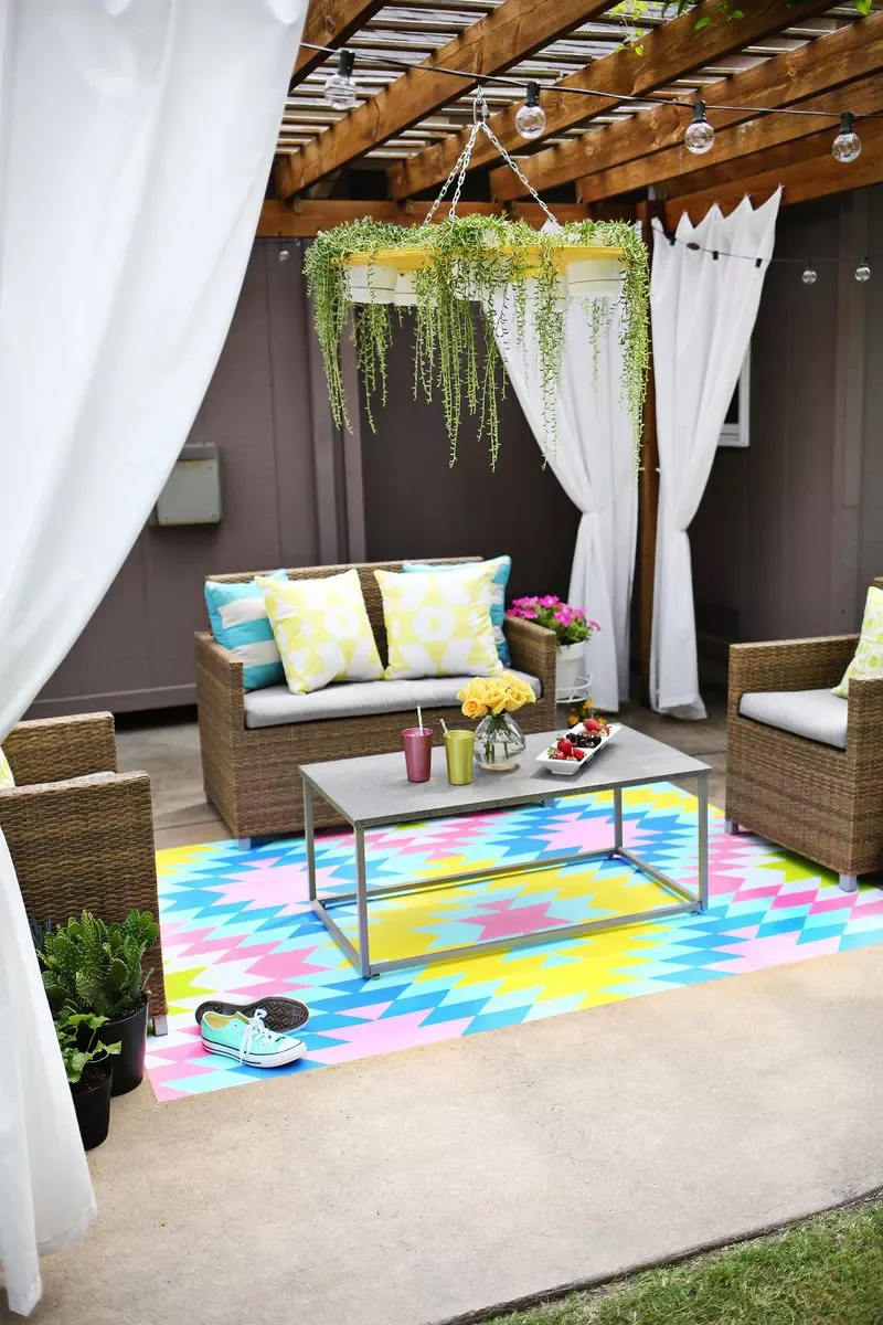 36 Concrete Patio Designs to Transform Your Backyard 33 Painted Rug Concrete Patio