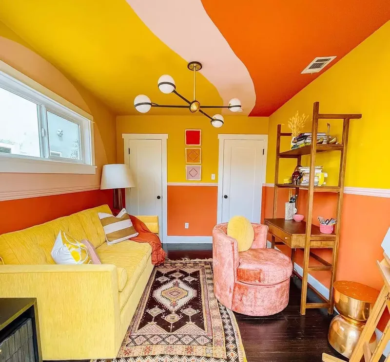 20 Yellow Living Room Ideas That Brighten Any Home 8 Pair It With Orange and Red