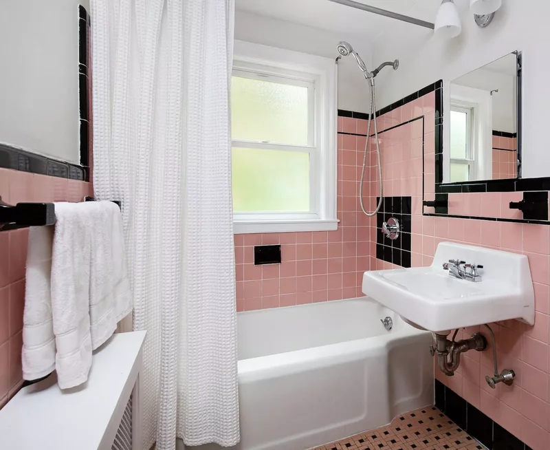20 Vintage-Inspired Bathrooms Overflowing with Retro Appeal 9 Pair Pink and Black