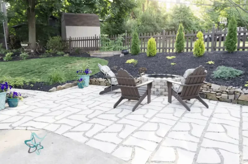 16 Patio Extension Ideas to Instantly Expand Your Space 4 Patio Extension With Wavy Pavers and Gravel