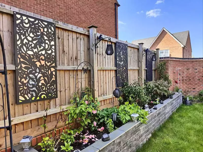 30 Creative Fence Decorating Ideas to Transform Your Yard 5 Pick Up a Few Decorative Panels
