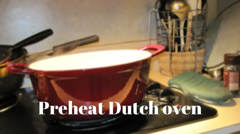 Preheat Dutch oven