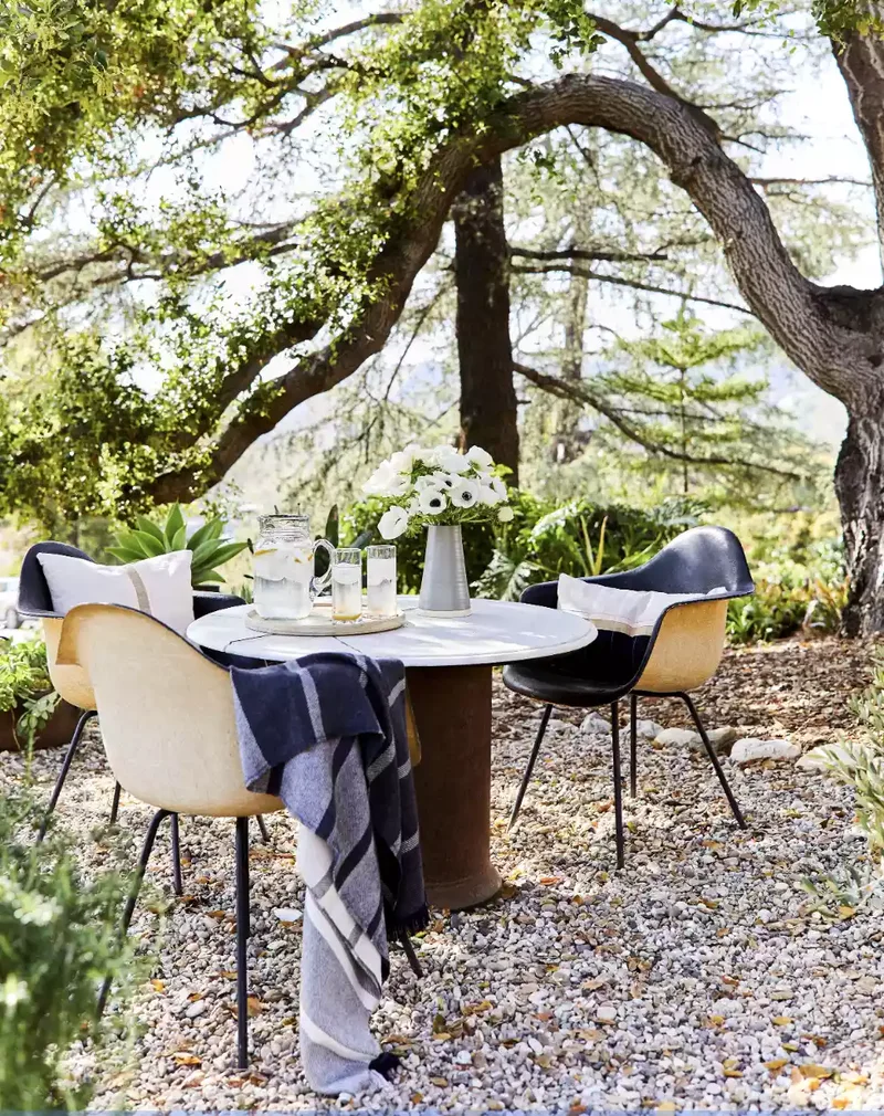 26 Secret Garden Ideas to Bring Your Favorite Books to Life 14 Put a Dining Area Under a Tree