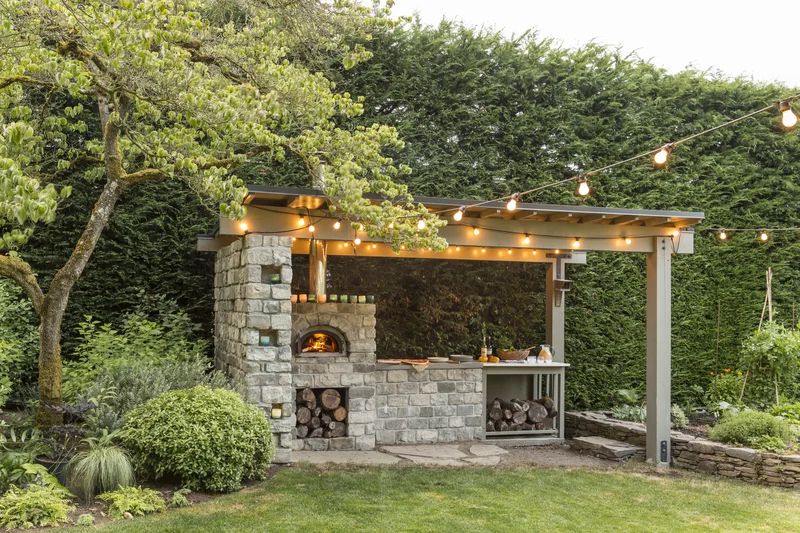 15 Backyard Grill Ideas for Your Summer Entertaining Space 7 Put in a Pizza Oven