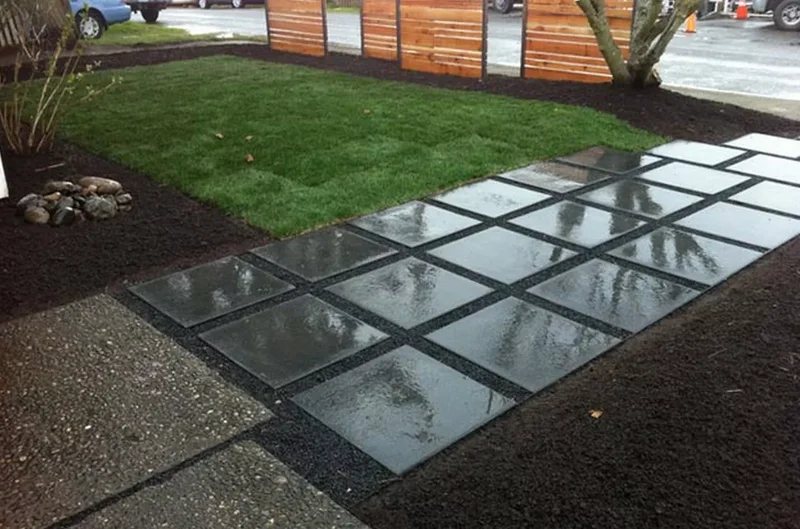 10 Modern Concrete Paver Walkway Ideas for Your Home 2 Rain-Glossy Concrete Front Square Walkway