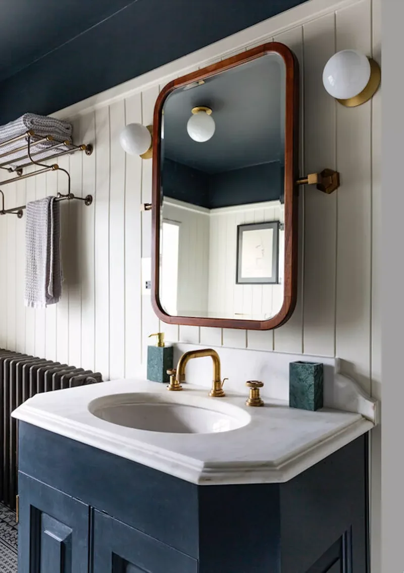 20 Vintage-Inspired Bathrooms Overflowing with Retro Appeal 16 Repurpose a Vintage Train Rack