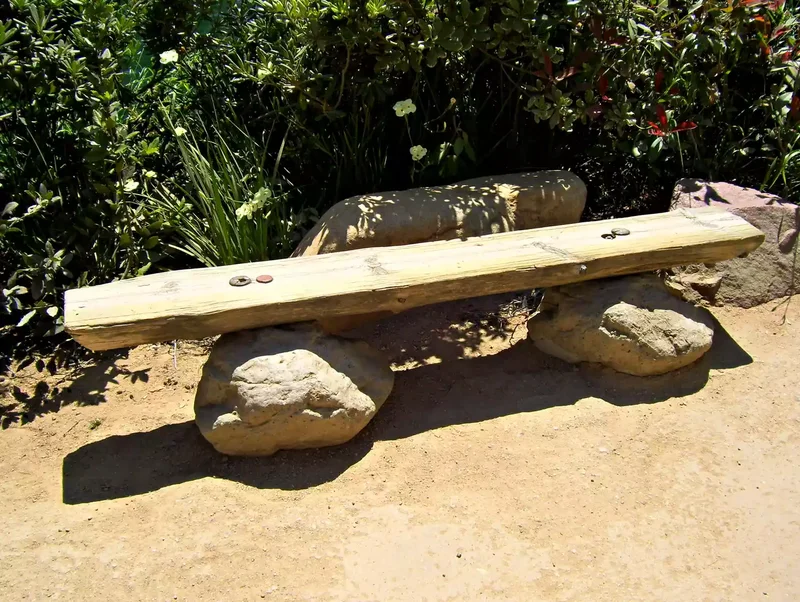 15 Beautiful Garden Bench Ideas to Transform Your Yard 7 Rock-Leg Bench